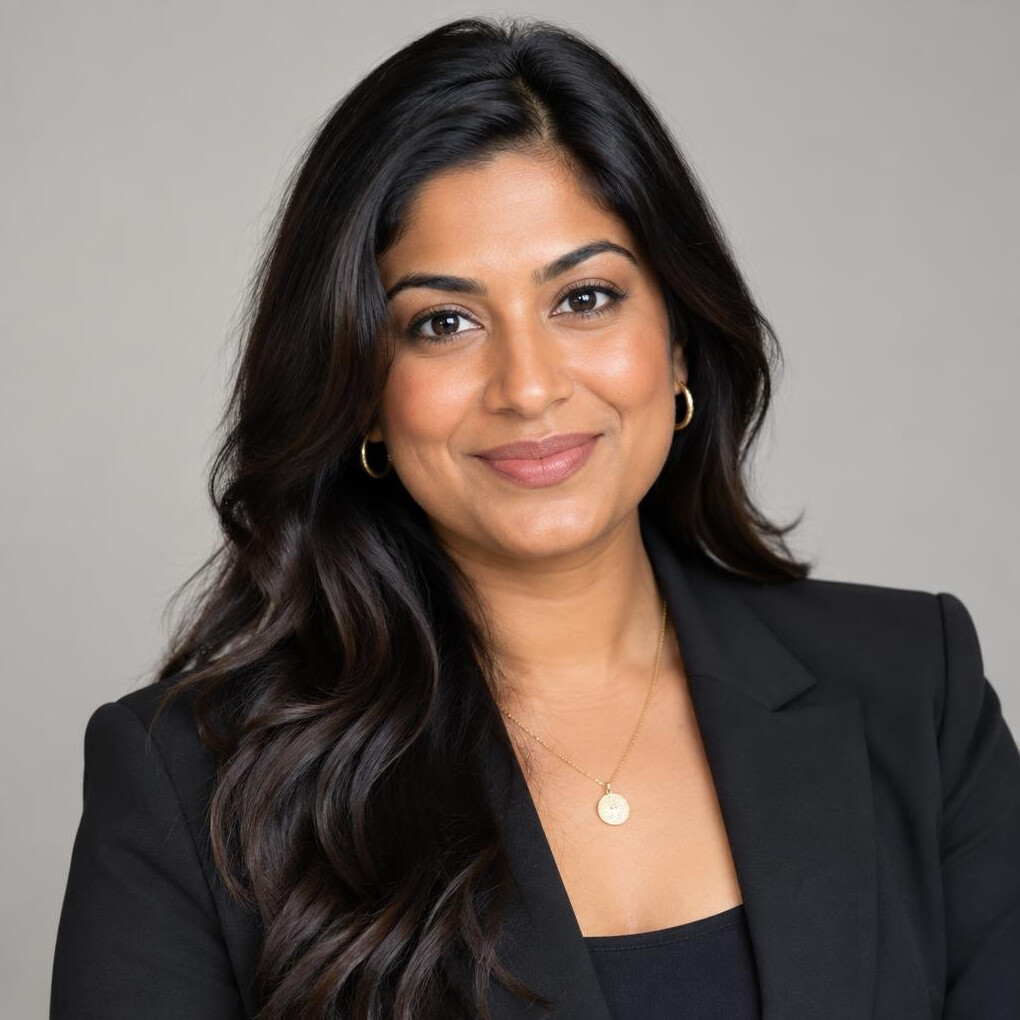 Portrait of a British Indian woman, event producer, professional headshot
