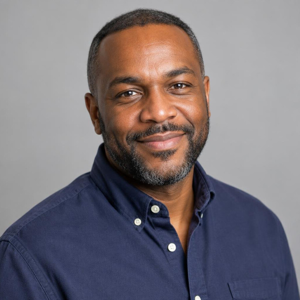 Portrait of a Black British man, lighting supervisor, professional headshot